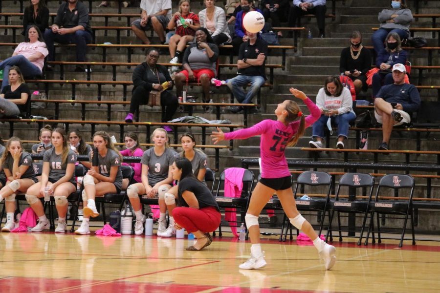 Sophomore Sarah Seabrooke spikes the ball in the first set of the match.