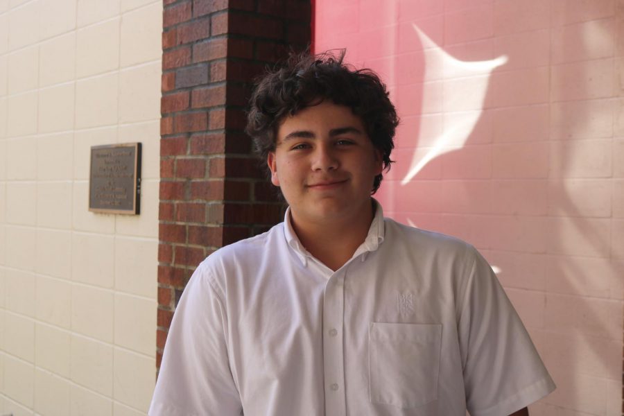 Sophomore Ricardo Salas stands in the 100 building courtyard. 