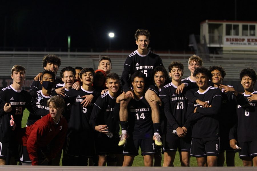 The team celebrates their first win of 2021 with a group picture. 