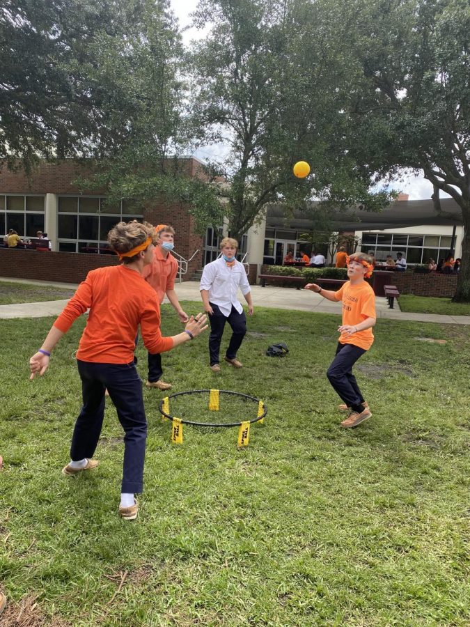 The sophomore boys play spike ball on color your class day.