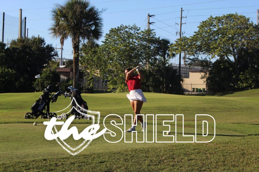 Senior Emily Williams tees off on hole two.