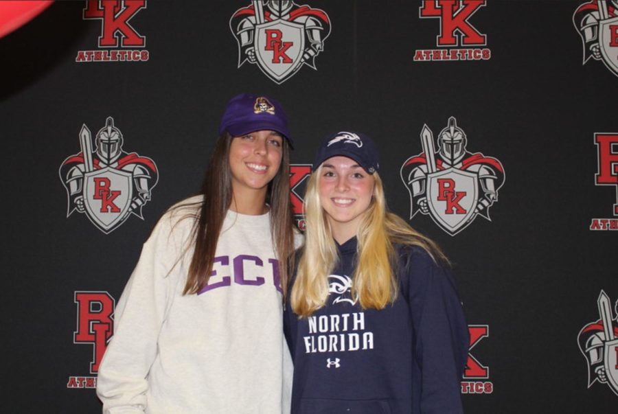 Seniors Mackenna Gregory and Maddie Millar posing together before signing their letters of intent. 