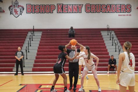 The game begins with Junior Clare Coyle getting ready for the tip off.