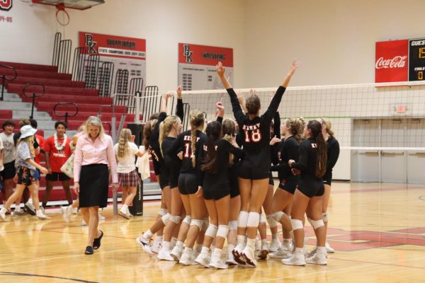 The girls volleyball team expresses happiness as they just won against Ponte Vedra for the first time in seven years.