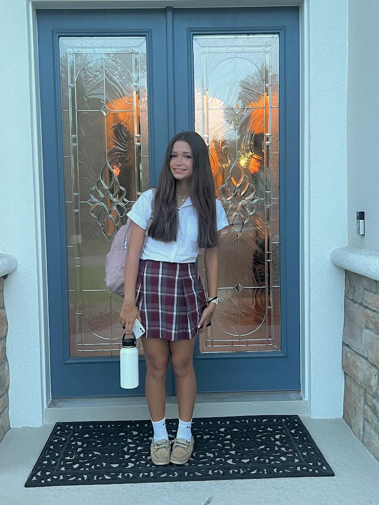 Scarlett Gibbs takes first day of school photo