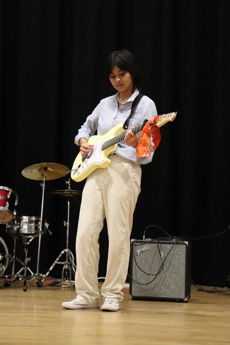 Junior Francheska Pore shows off her skills on the bass guitar