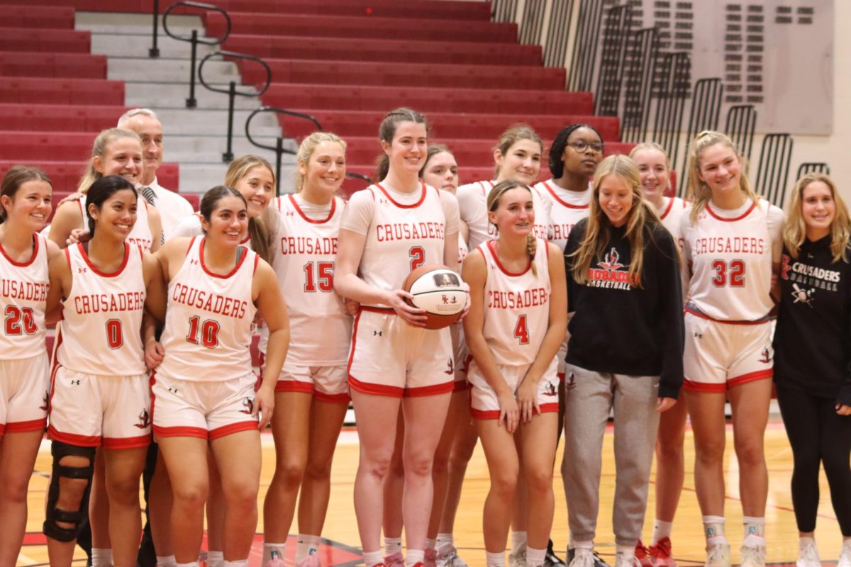 The+whole+team+comes+on+the+court+to+celebrate+Clare+Coyle+in+her+big+accomplishment+of+1%2C000+points.