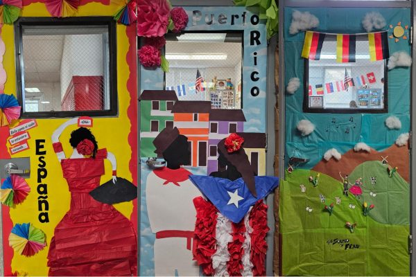 World languages teachers decorate their doors with colorful paper.