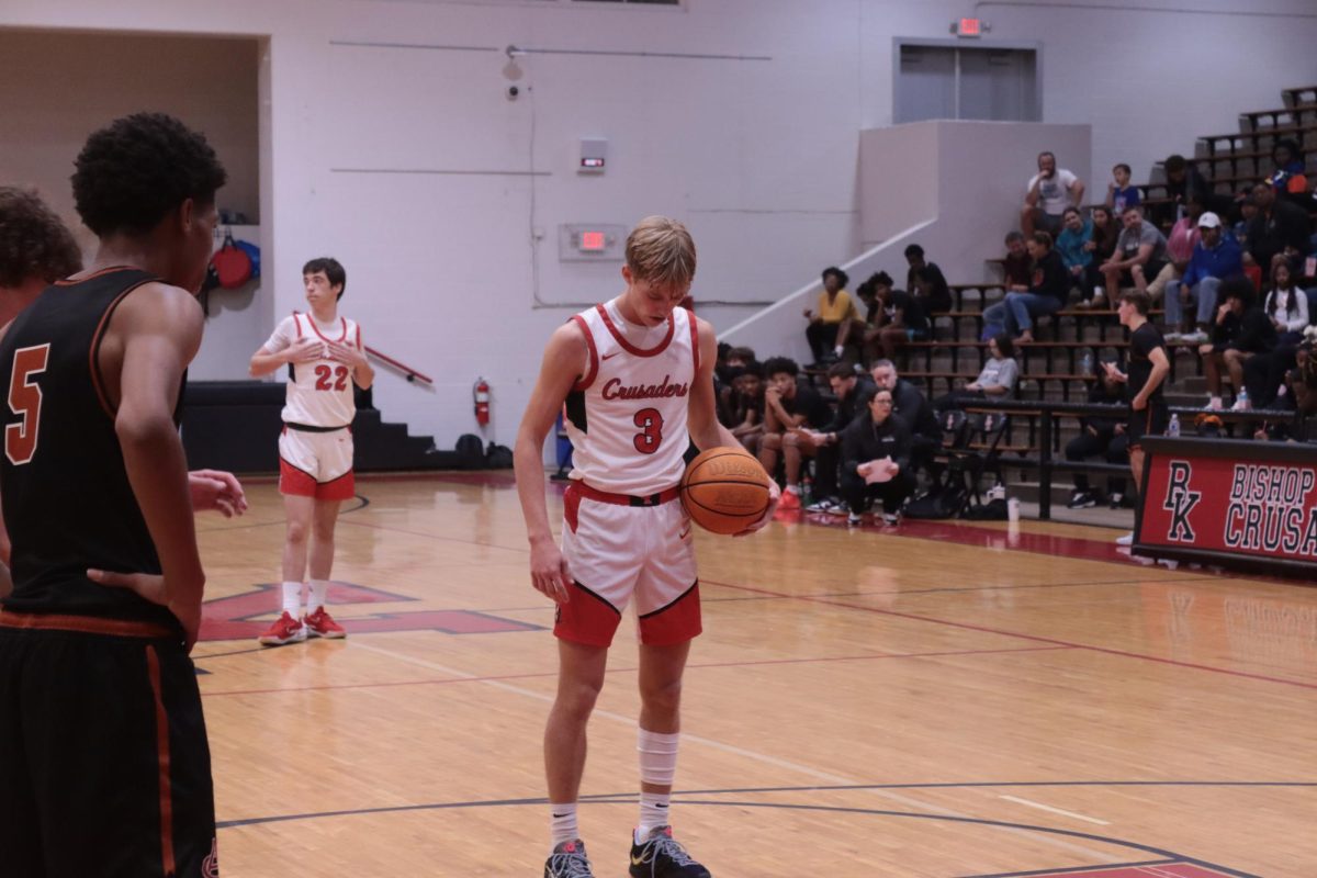 Senior Adam Enoch lining up for the free throw.