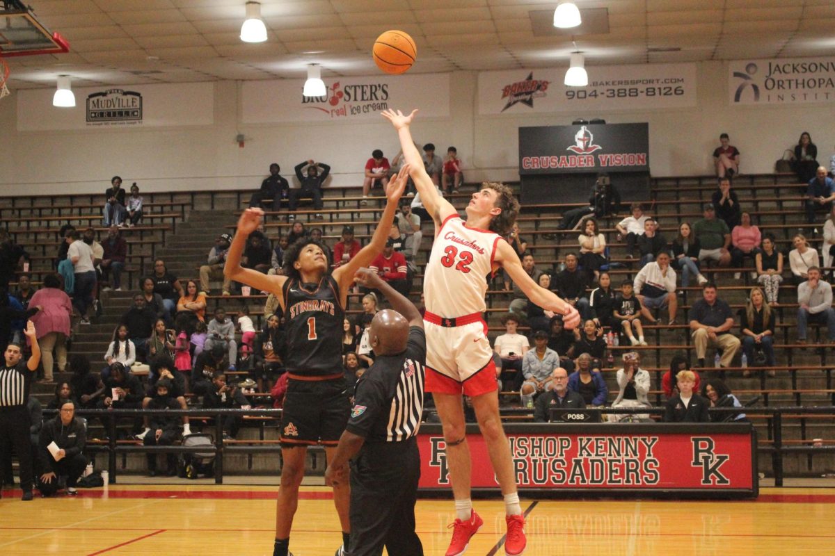 Junior Jack Lyons going up for the jump ball.