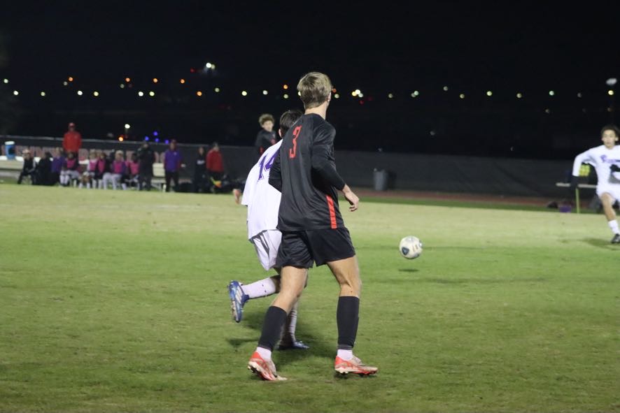 Senior James Warren follows the ball down the field.