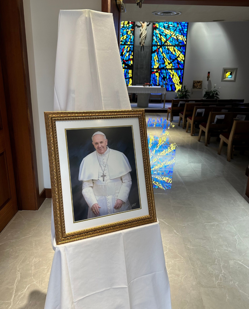 The Bishop Kenny Instagram shares a framed picture of Pope Francis in the chapel.